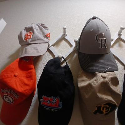 6 Sports Team Baseball Caps with wooden holder