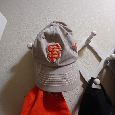 6 Sports Team Baseball Caps with wooden holder