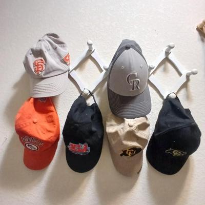 6 Sports Team Baseball Caps with wooden holder