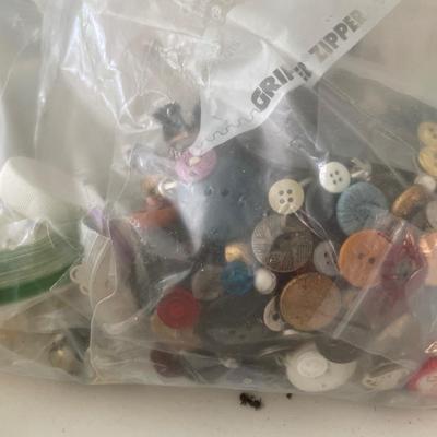 Wash basin and bag of buttons
