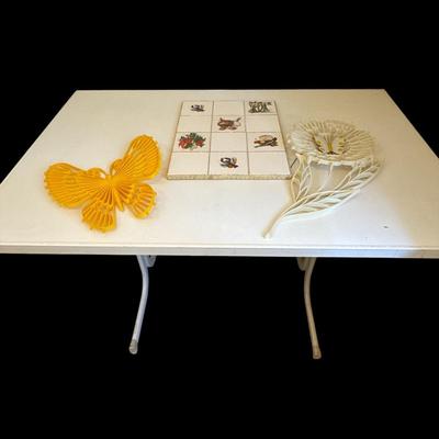 “Drafting” table and vintage wall decor
