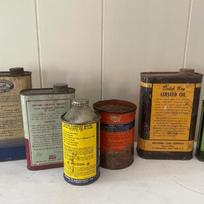 Vintage oil and grease cans