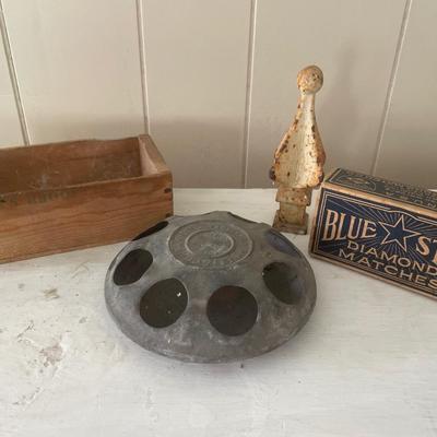 Chicken feeder, matches box and metal too