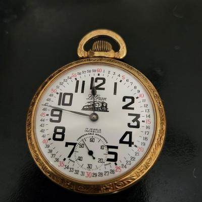 Sale Photo Thumbnail #241: This watch winds easily and is working.  Arnex 17 jewel Incabloc (shock protection).  Commemorative.
Train locomotive etched on the back.  No markings for metal content.
Retail $100