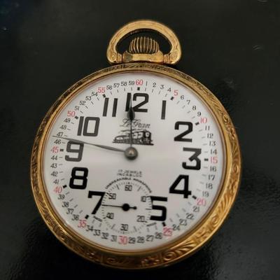 Sale Photo Thumbnail #242: This watch winds easily and is working.  Arnex 17 jewel Incabloc (shock protection).  Commemorative.
Train locomotive etched on the back.  No markings for metal content.
Retail $100
