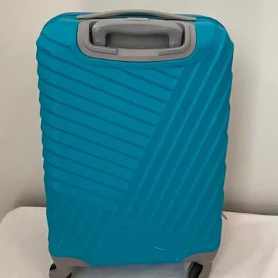 American Tourist hardcover suitcase