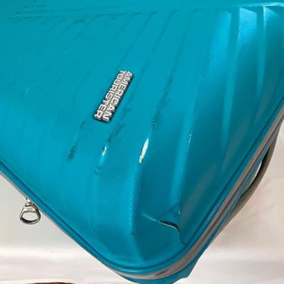 American Tourist hardcover suitcase