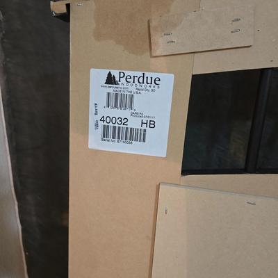 Full sized bed with wooden Purdue headboard with mattress and boxsprings and bedding