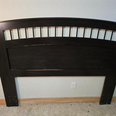 Full sized bed with wooden Purdue headboard with mattress and boxsprings and bedding