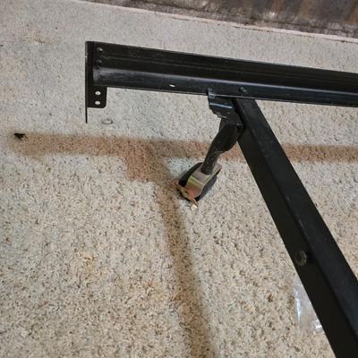 Full sized bed with wooden Purdue headboard with mattress and boxsprings and bedding