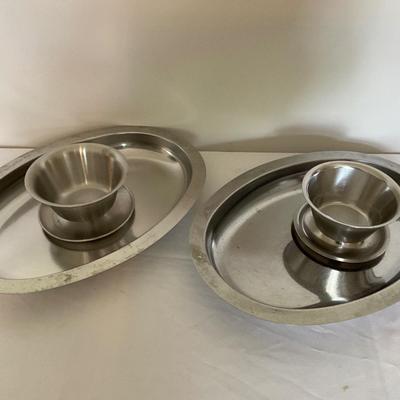 Silver serving platters and bowls