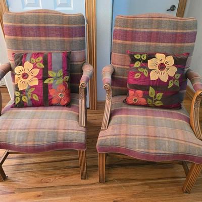 Pair of Upholstered Accent Chairs with Carved Wood Arms & Floral Pillows