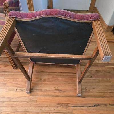 Pair of Upholstered Accent Chairs with Carved Wood Arms & Floral Pillows