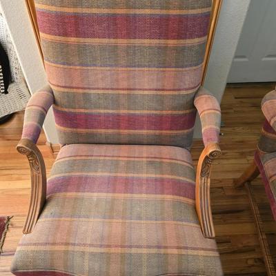Pair of Upholstered Accent Chairs with Carved Wood Arms & Floral Pillows