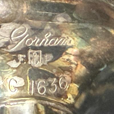 Sale Photo Thumbnail #209: Gotham Electroplate Silver Plate twisted handle baby rattle. Some tarnish from being handled but in very good condition. Approx. 4" long.