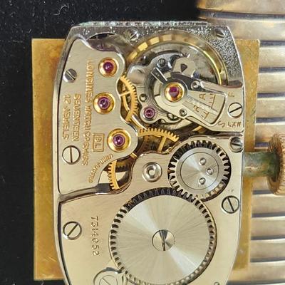 Sale Photo Thumbnail #243: Longines & Wittnauer Watch Co. Inc.  New York Geneva Montreal
K & L 14 K gold  case # 762857     Timepiece # 7314052
17 jewels    9 L    1947 manufacture
Mechanical manual set / wind.   It is working
It obviously has some wear and needs a good cleaning,  