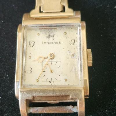 Sale Photo Thumbnail #251: Longines & Wittnauer Watch Co. Inc.  New York Geneva Montreal
K & L 14 K gold  case # 762857     Timepiece # 7314052
17 jewels    9 L    1947 manufacture
Mechanical manual set / wind.   It is working
It obviously has some wear and needs a good cleaning,  