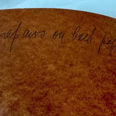 Sale Photo Thumbnail #136: Inside lined pages are unused, but there is a name written on the cover.
