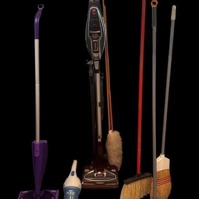 Cleaning supplies and ironing board