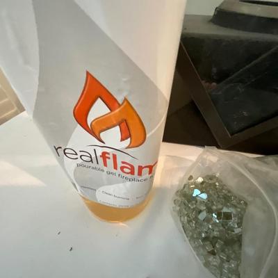 Fireplace w/rocks/real flame pourable Gel