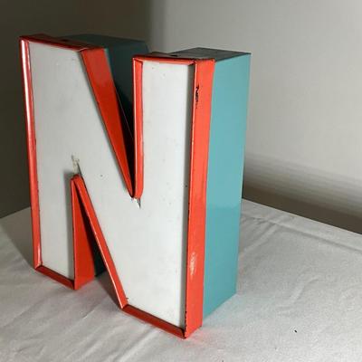 N White Sign