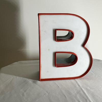 B White Sign