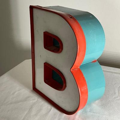 B White Sign