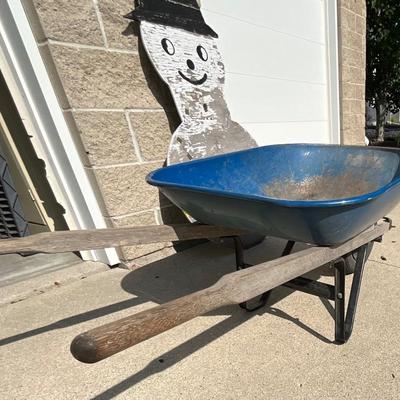 Wheel barrel and snowman decor