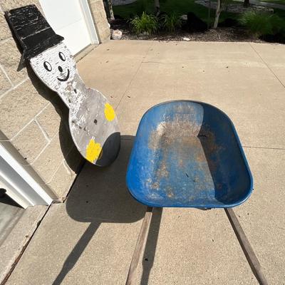 Wheel barrel and snowman decor