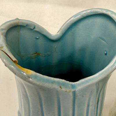 Sale Photo Thumbnail #575: San Juan Capistrano souvenir vase with small chips on top edge
Powder Blue vase with cracks and chip on top
Reddish Brown urn with stopper has no damage