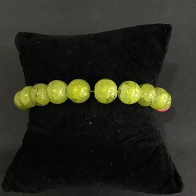 Unique beaded stretch bracelet with heart charm