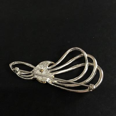 Gold and silver tone crescent moon brooch pin