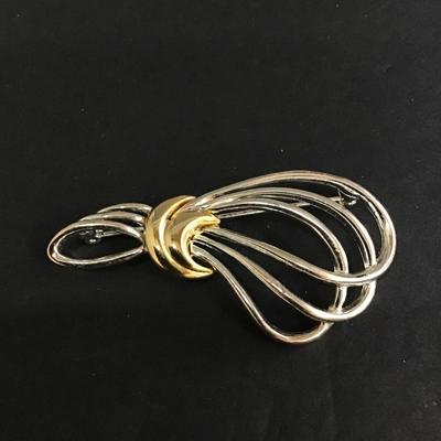 Gold and silver tone crescent moon brooch pin