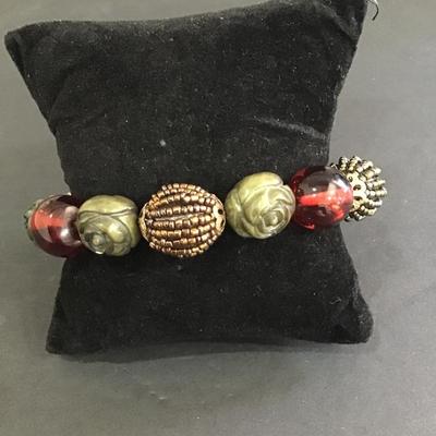 Red and green beaded stretch bracelet