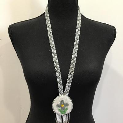 Gorgeous vintage handcrafted Native American beaded statement necklace. Very nice very beautiful