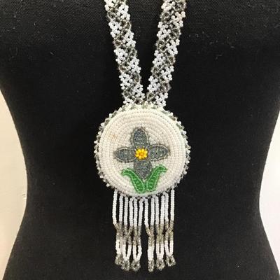 Gorgeous vintage handcrafted Native American beaded statement necklace. Very nice very beautiful