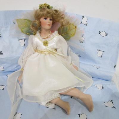 Sale Photo Thumbnail #107: Angel doll with fiber optic wings & porcelain head, arms & legs, Takes 3 AA batteries included, see pictures