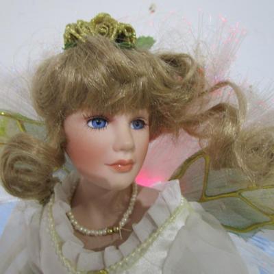 Sale Photo Thumbnail #111: Angel doll with fiber optic wings & porcelain head, arms & legs, Takes 3 AA batteries included, see pictures