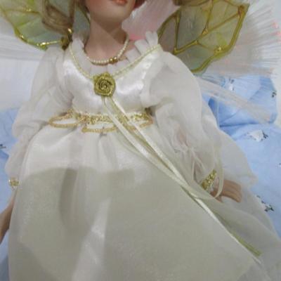 Sale Photo Thumbnail #112: Angel doll with fiber optic wings & porcelain head, arms & legs, Takes 3 AA batteries included, see pictures