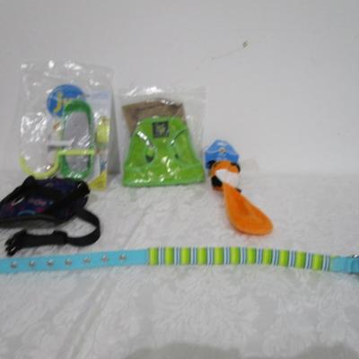 Sale Photo Thumbnail #223: Dog collar looks new, 2 harnesses (one new & one used), dog toy, in sight cuddle bone holder (for birds)