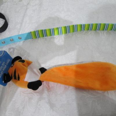 Sale Photo Thumbnail #227: Dog collar looks new, 2 harnesses (one new & one used), dog toy, in sight cuddle bone holder (for birds)