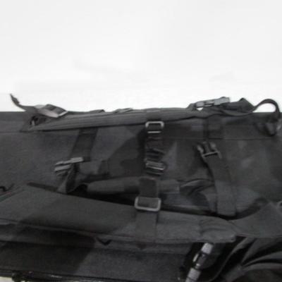 Sale Photo Thumbnail #253: Has backpack straps and 5 smaller pockets, 1 larger zipper pocket, & zippered area for the rifle, 36" long x 12" wide x 3" deep, See pictures