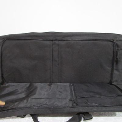 Sale Photo Thumbnail #255: Has backpack straps and 5 smaller pockets, 1 larger zipper pocket, & zippered area for the rifle, 36" long x 12" wide x 3" deep, See pictures