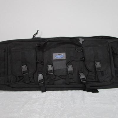 Sale Photo Thumbnail #249: Has backpack straps and 5 smaller pockets, 1 larger zipper pocket, & zippered area for the rifle, 36" long x 12" wide x 3" deep, See pictures