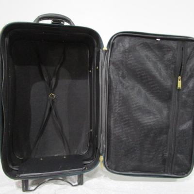 Sale Photo Thumbnail #259: 9-1/2" deep with 2-1/2" expansion x 20-1/2" (without the wheels) x 14" across. Has three outside zippered pockets, has expander section & 2 wheels