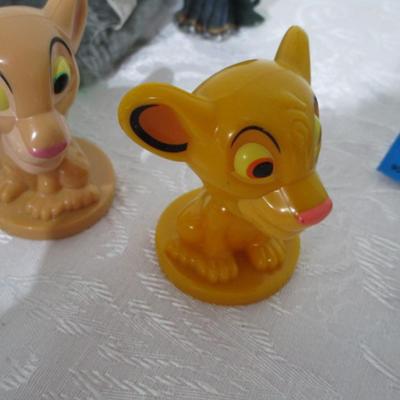 Sale Photo Thumbnail #287: Transformer car, small car , animals, 2 dolls, Lion King figures, marbles, hand puppet, etc