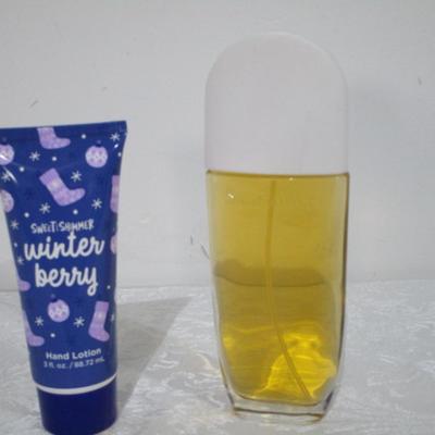 Sale Photo Thumbnail #291: 1 Sunflowers by Elizabeth Arden 3.3 fl. Oz. perfume, 1 New Winterberry lotion (sealed) 3 oz.