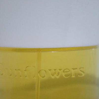 Sale Photo Thumbnail #292: 1 Sunflowers by Elizabeth Arden 3.3 fl. Oz. perfume, 1 New Winterberry lotion (sealed) 3 oz.
