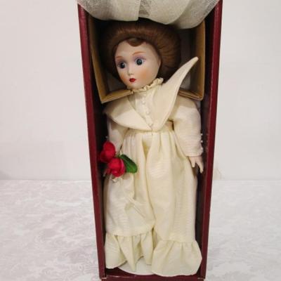 Sale Photo Thumbnail #374: New in box, porcelain doll includes stand, 13" tall