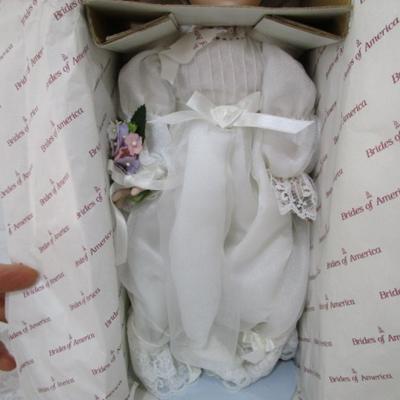 Sale Photo Thumbnail #377: New in box, porcelain doll includes stand, 13" tall